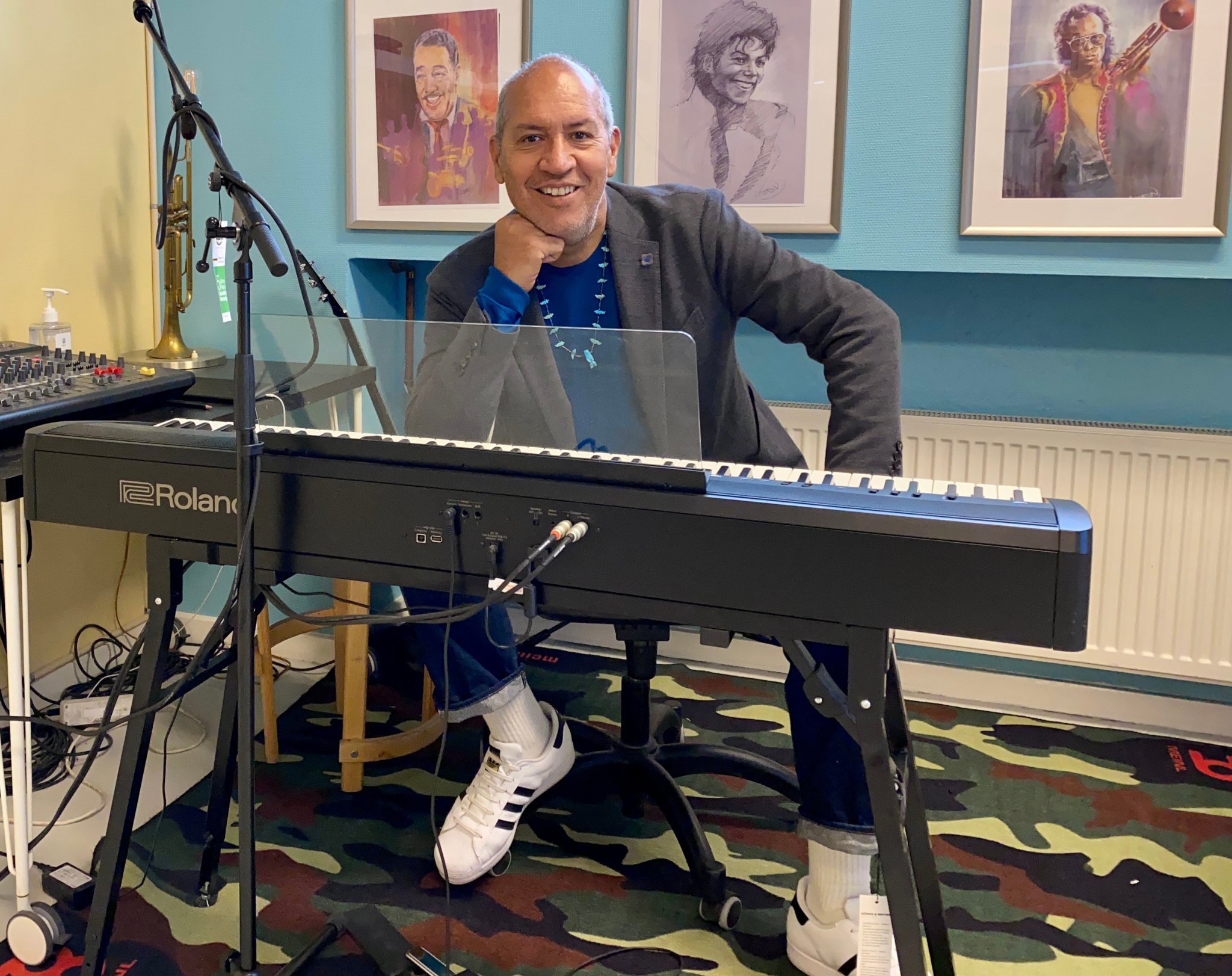 Albert Campos at a Roland keyboard in the music classroom