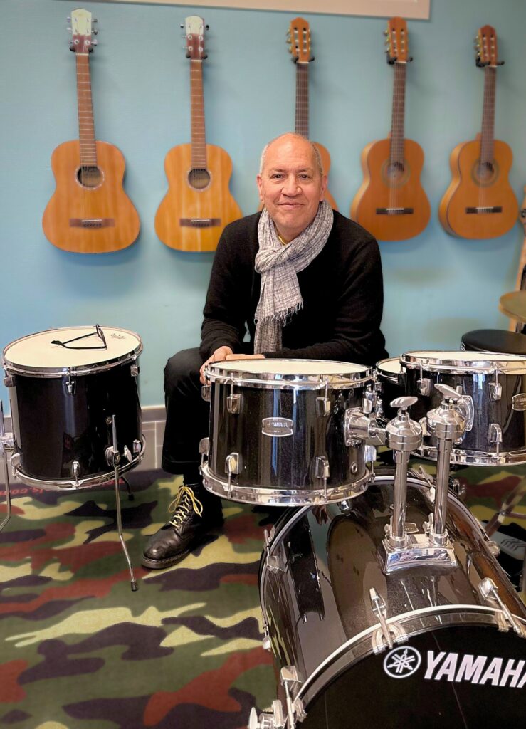 Albert Raymond Campos leading a music session